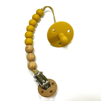 نگهدارنده پستانک سیلیکونی ODM Baby Teething Chew گیره پستانک مهره چوبی